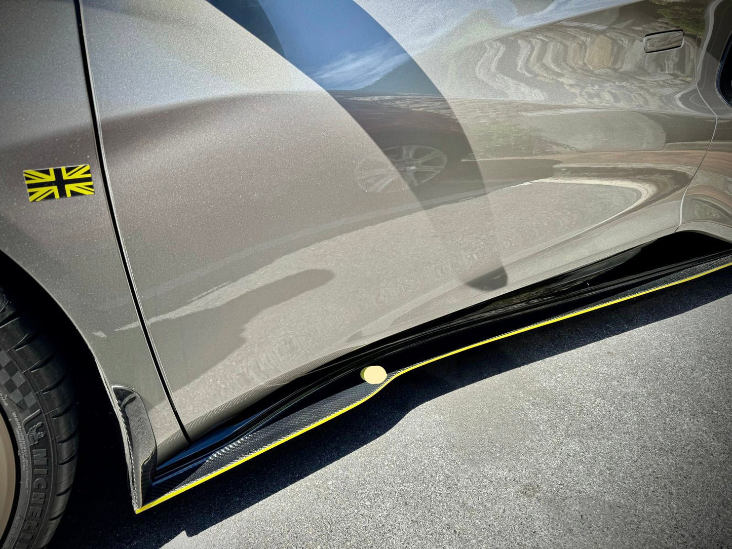 Emira Carbon Fiber side skirts by Aerie Performance