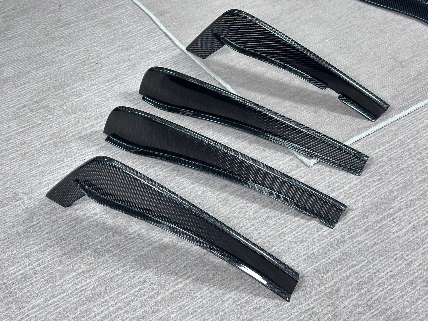 Emira carbon fibre diffuser extension by Aerie Performance